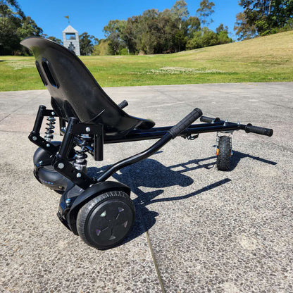 The RIDEO Hoverboard Go-Kart A5 parked in a scenic outdoor area, showing off its sleek black design and durable wheels suitable for all terrains.