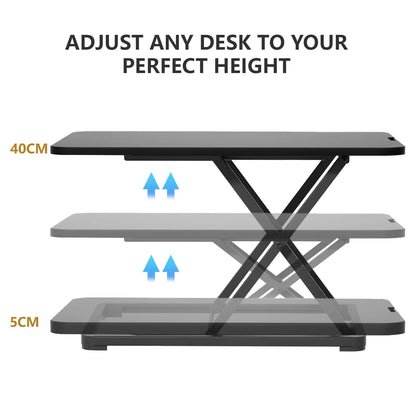 A technical diagram showing the adjustable height levels of a black desk riser from 5 cm to 40 cm, illustrating the desk's flexibility.