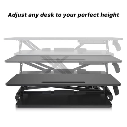 Illustration highlighting the features of a black desk converter, such as adjustable height levels, with a side view showing the design's mechanics.